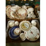 Two trays of ceramic tableware to include tureens, teapots, plates, meat plates etc.