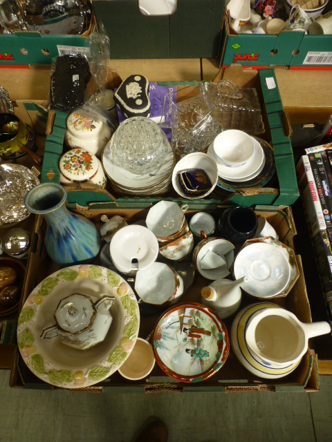 Two trays of assorted items to include a glass cheese dish, black and white jasper ware trinket,