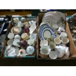 Two trays of ceramic ware to include plates, cups, saucers, vases etc.