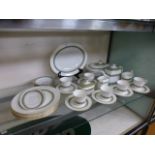 A Royal Doulton Rondaley pattern part table service to include tureens, teapot, platter, cups,