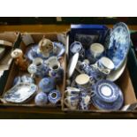 Two trays of mainly blue and white ceramic ware to include plates cups, saucers, vases etc.