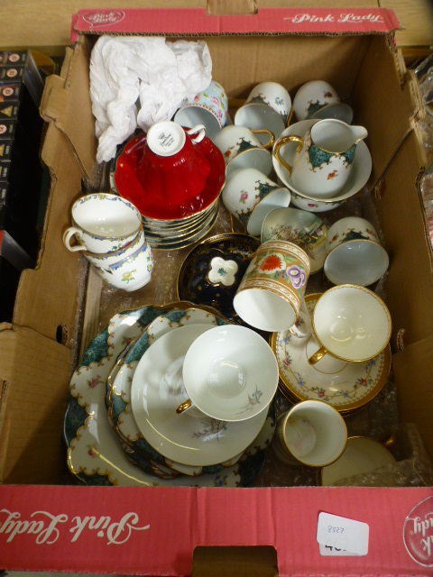 A tray containing decorative cups and saucers etc.
