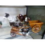 Five ceramic models of horses together with two carts