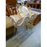 A mid-20th century cream painted metalwork convex wall mirror together with a white painted planter