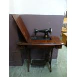 An early 20th century treadle Singer sewing machine