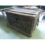 A large wicker laundry basket