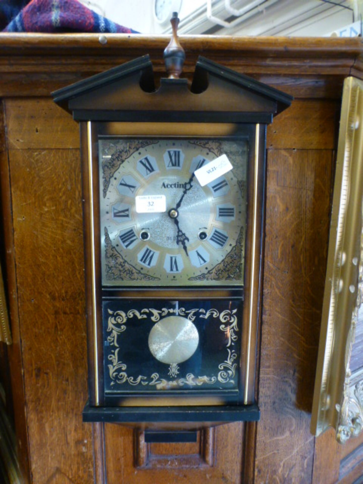 A modern drop dial wall clock