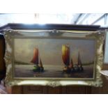 A gilt framed oil on canvas of sailing boats signed T.