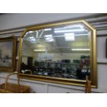 A modern gilt framed bevel glass wall mirror