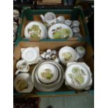 Two trays of mid 20th century Denby tableware to include plates, teapot, cups, saucers etc.