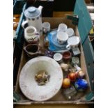 A tray containing a selection of mid-20th century ceramic ware, Russian dolls, Wade whimsies etc.