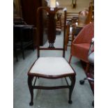 An early 20th century mahogany inlaid hall chair