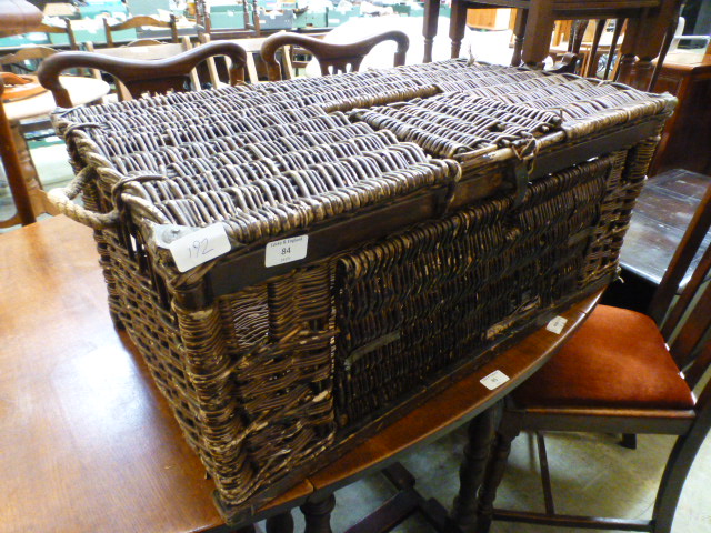 A wicker pigeon carrying basket