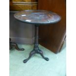 An 18th century mahogany tripod table