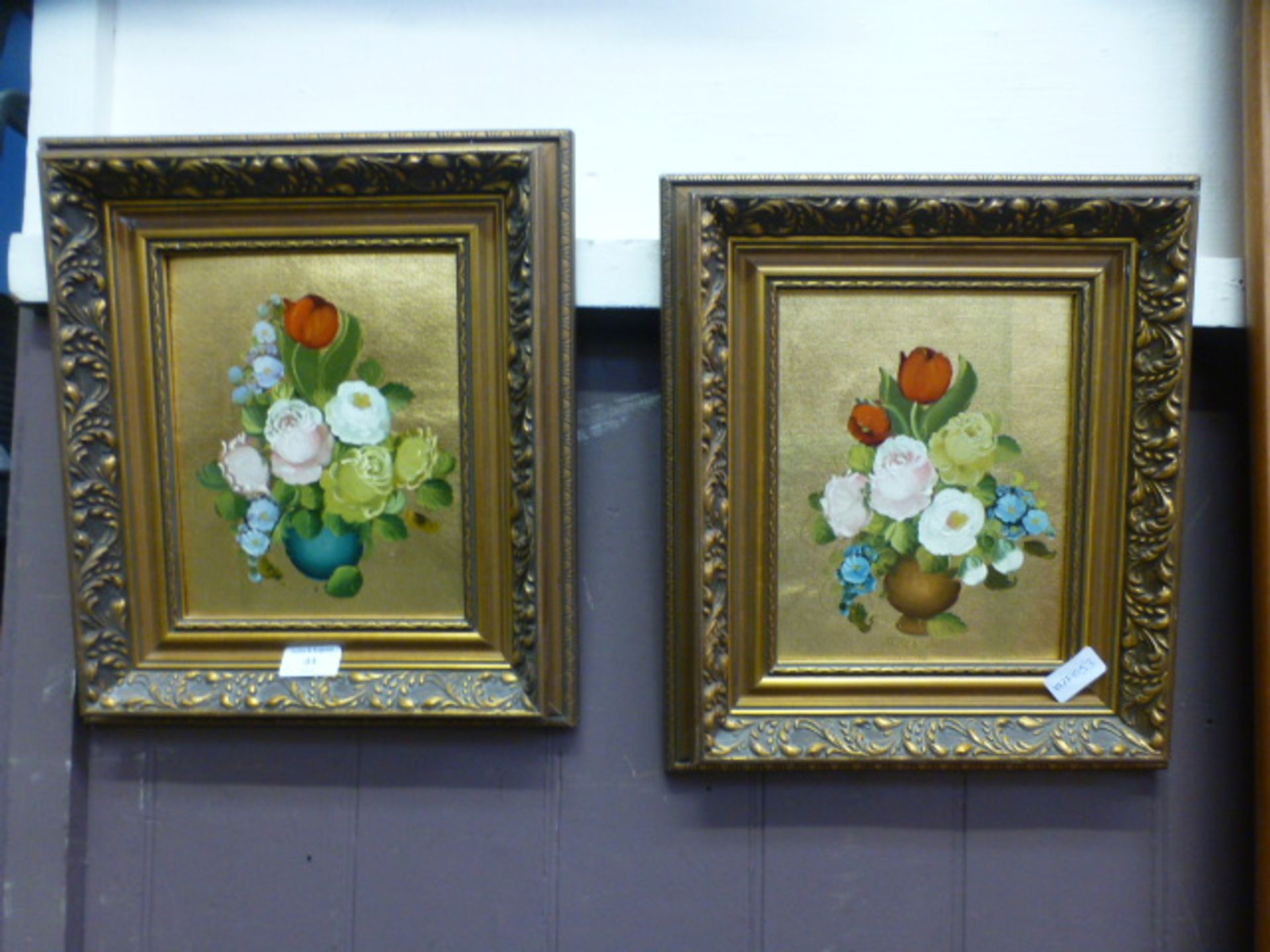 A pair of gilt framed oils on board of still life signed Rosini