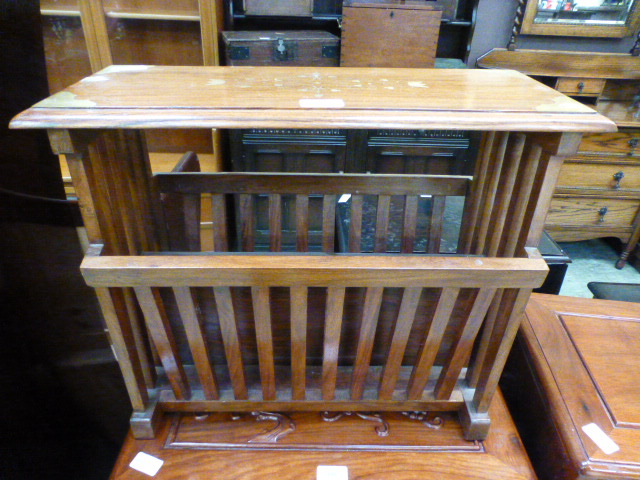 An Indian hardwood magazine rack with brass inlay CONDITION REPORT: No apparent