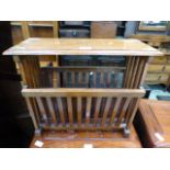 An Indian hardwood magazine rack with brass inlay CONDITION REPORT: No apparent