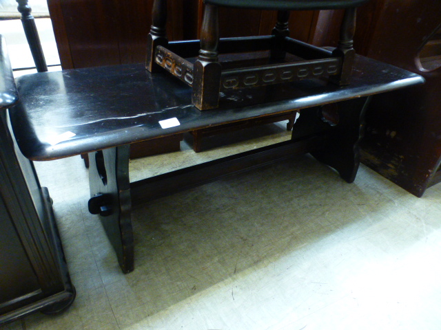 A dark oak rectangular refectory style occasional table