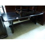 A dark oak rectangular refectory style occasional table