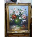 A gilt framed oil on board of still life signed G.