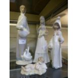 A Lladro figure of a girl with a stick together with a Lladro figure of a sleeping baby and two