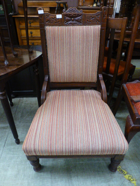 An Edwardian walnut framed parlour chair