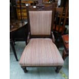 An Edwardian walnut framed parlour chair