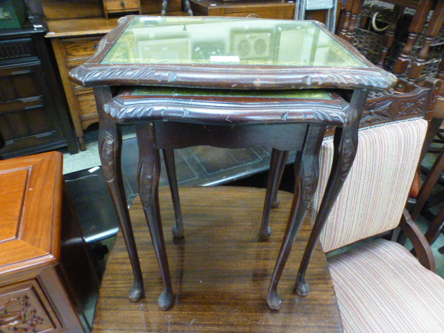 A nest of two reproduction mahogany occasional tables