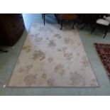 A modern Laura Ashley rectangular rug with rose design