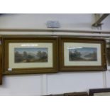 A pair of gilt framed watercolours of countryside,