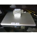 An Apple Mac book CONDITION REPORT: Appears to be in working order