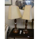 A pair of Indian floral carved table lamps