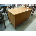 A mid-20th century teak veneered blanket box