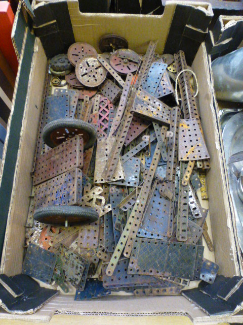 A tray containing a quantity of Meccano pieces