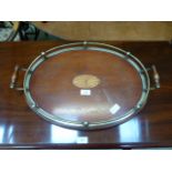 A galleried oval twin handled tray with inlay to centre