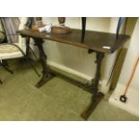 A late 19th century mahogany topped and cast iron based table