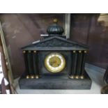 A Victorian slate mantle clock of architectural form