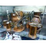 An assortment of brass, copper and other metalware to include coal scuttle, tankard etc.