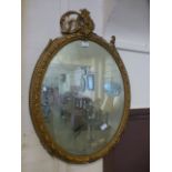 A gilt framed oval mirror A/F