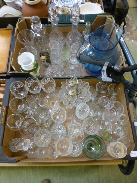 Two trays of assorted glass ware to include drinking vessels,