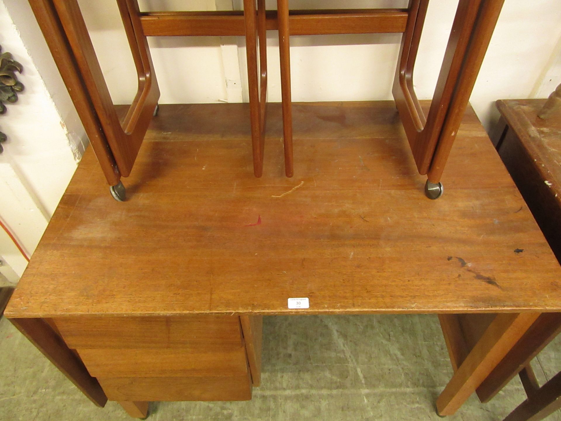 A mid-20th century teak desk with three drawers and hidden cupboard by Remploy CONDITION - Image 2 of 3