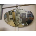 An early 20th century bevelled glass mirror