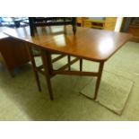 A mid-20th century teak and beech drop leaf table