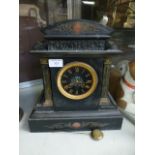 A Victorian slate and marble inlaid mantle clock,