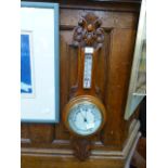 An early 20th century oak banjo barometer