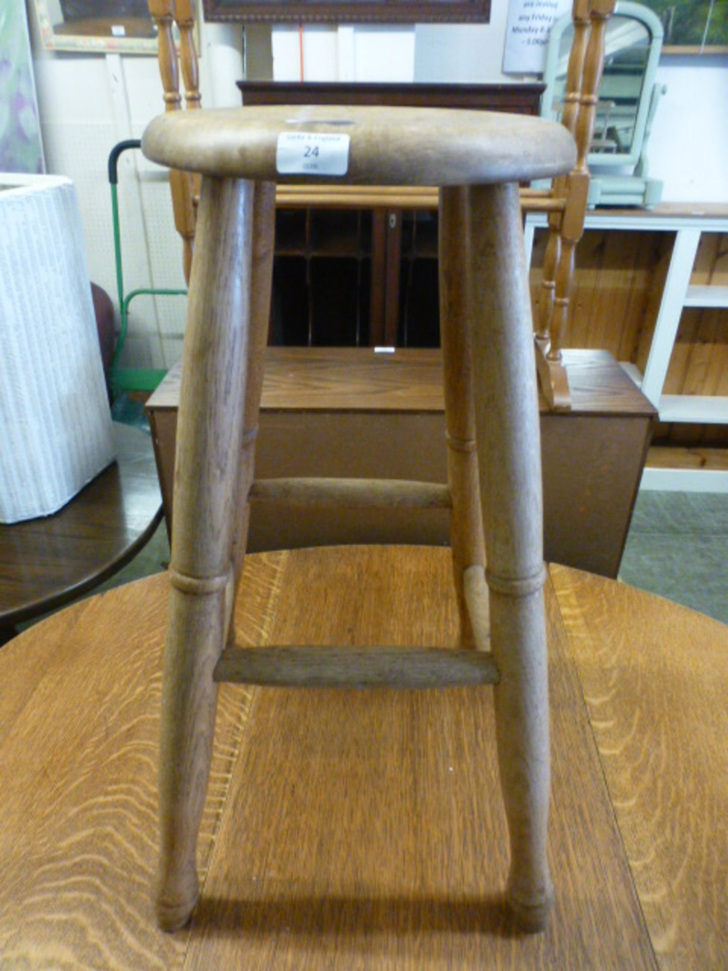 A turned oak penny seated stool