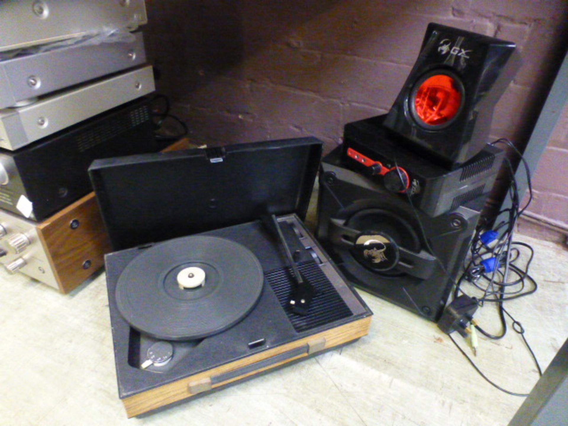 A turntable along with gaming speakers