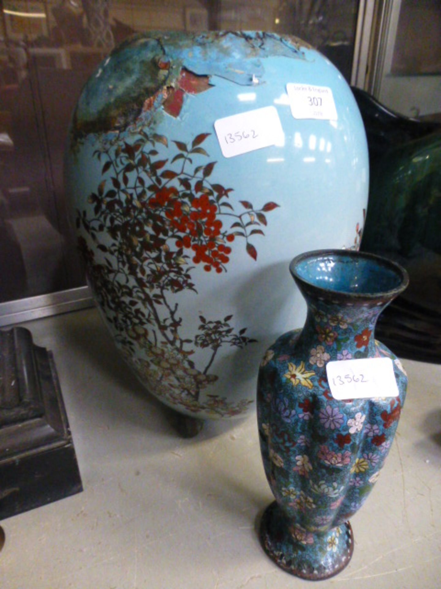 A large Japanese cloisonne vase of ovoid form together with one smaller (A/F)