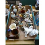 A tray containing mainly ceramic figurines, vases etc.