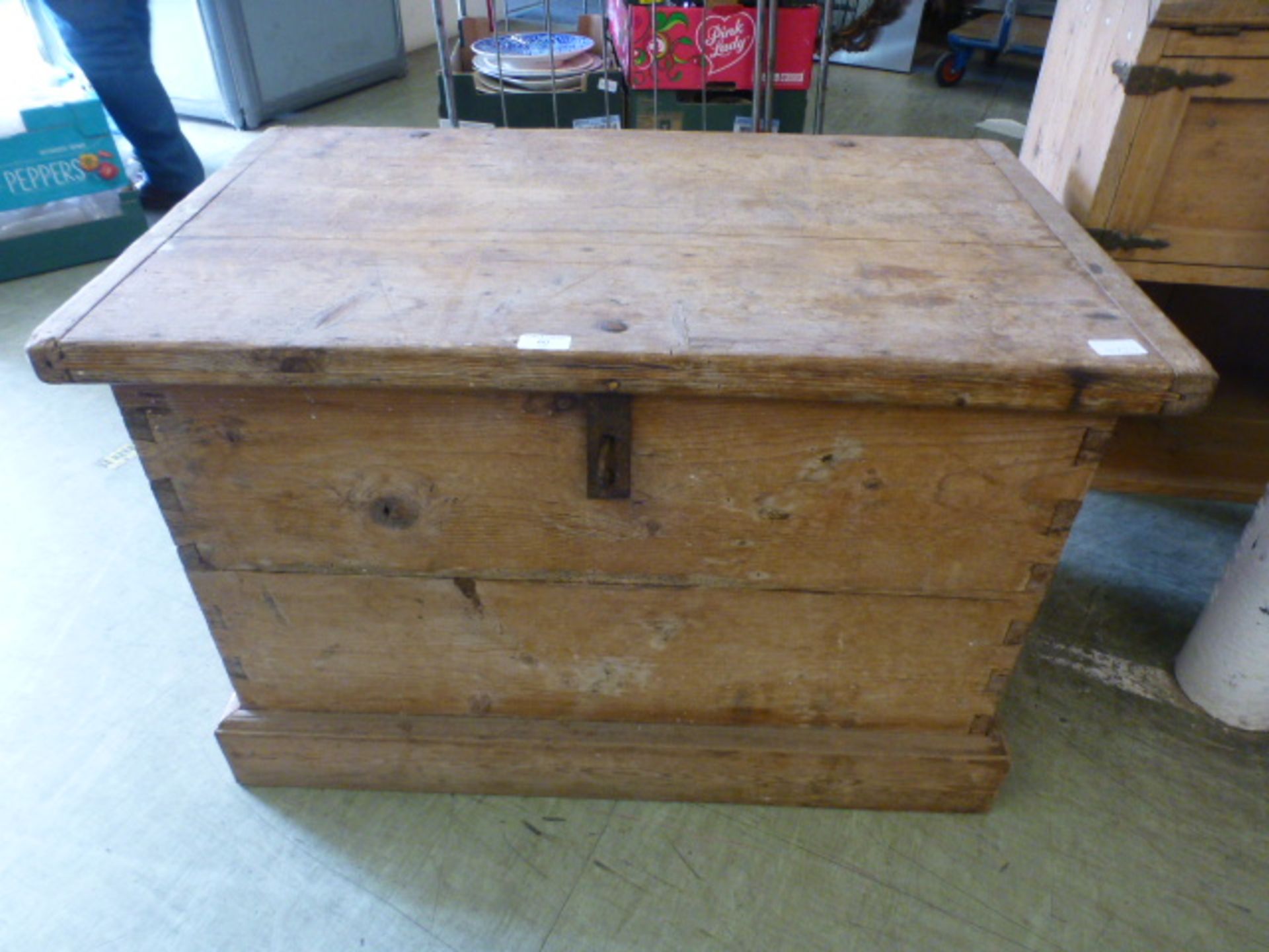 A 19th century pine box with iron carry handles and lock